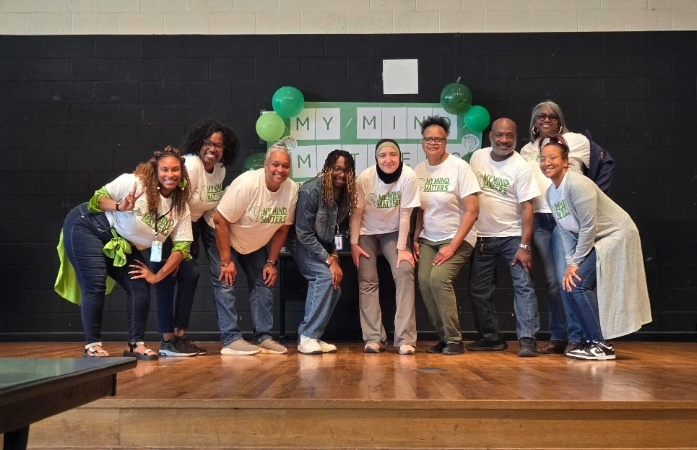 Staff wearing my mind matters shirts on stage